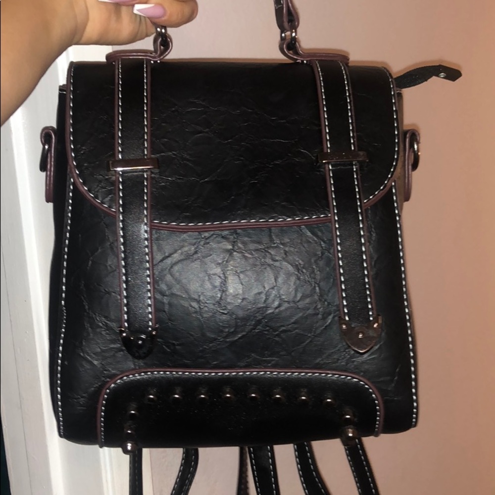 Small black leather stuffed backpack